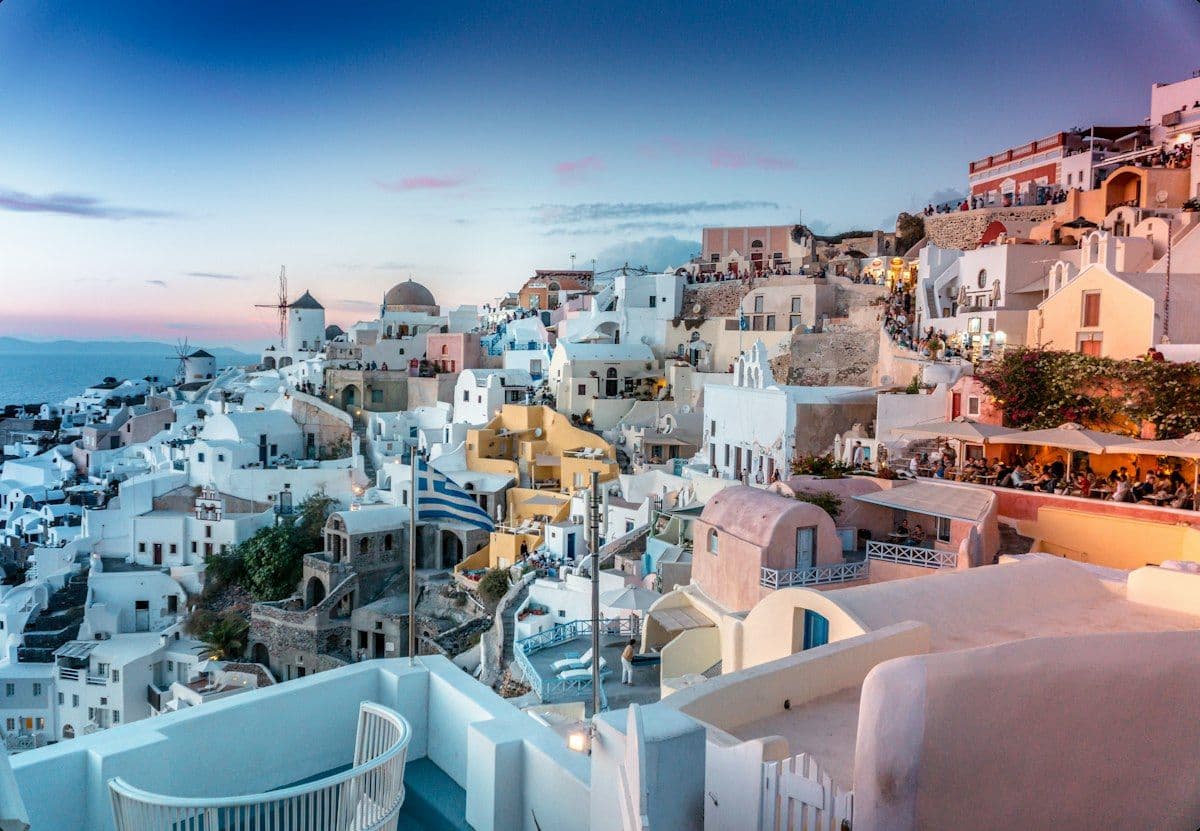Santorini Blue Domes and Caldera Sunset in Oia, Greece